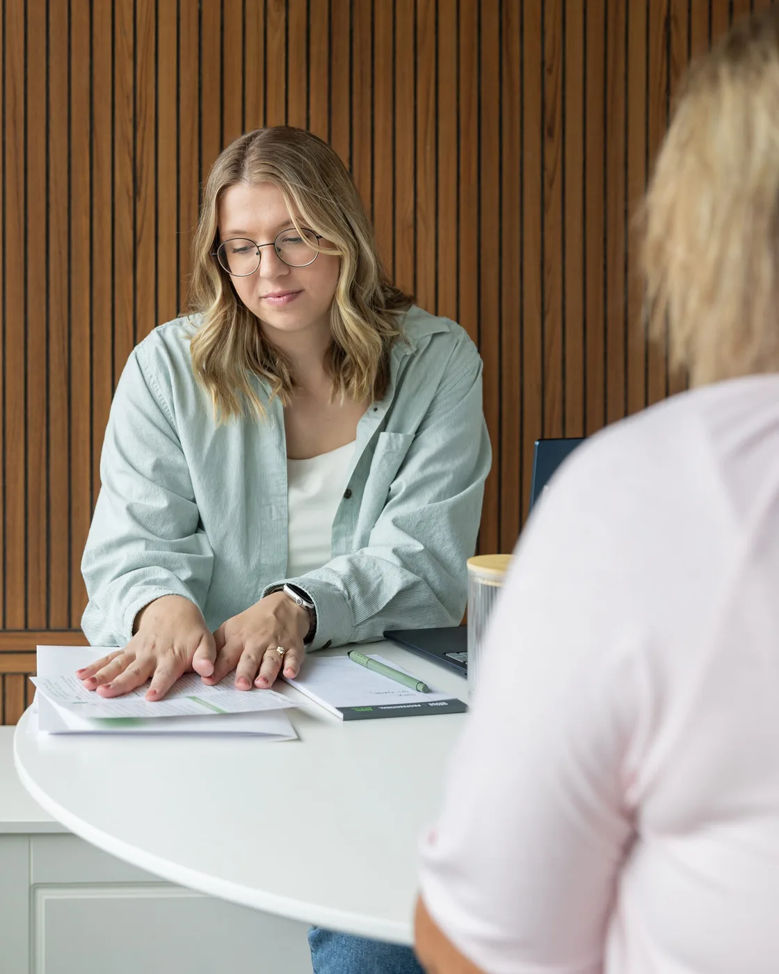 Dr. Abbie Siudzinski, ND, in consultation with a patient at Foundations Natural Health, Excelsior, Minnesota