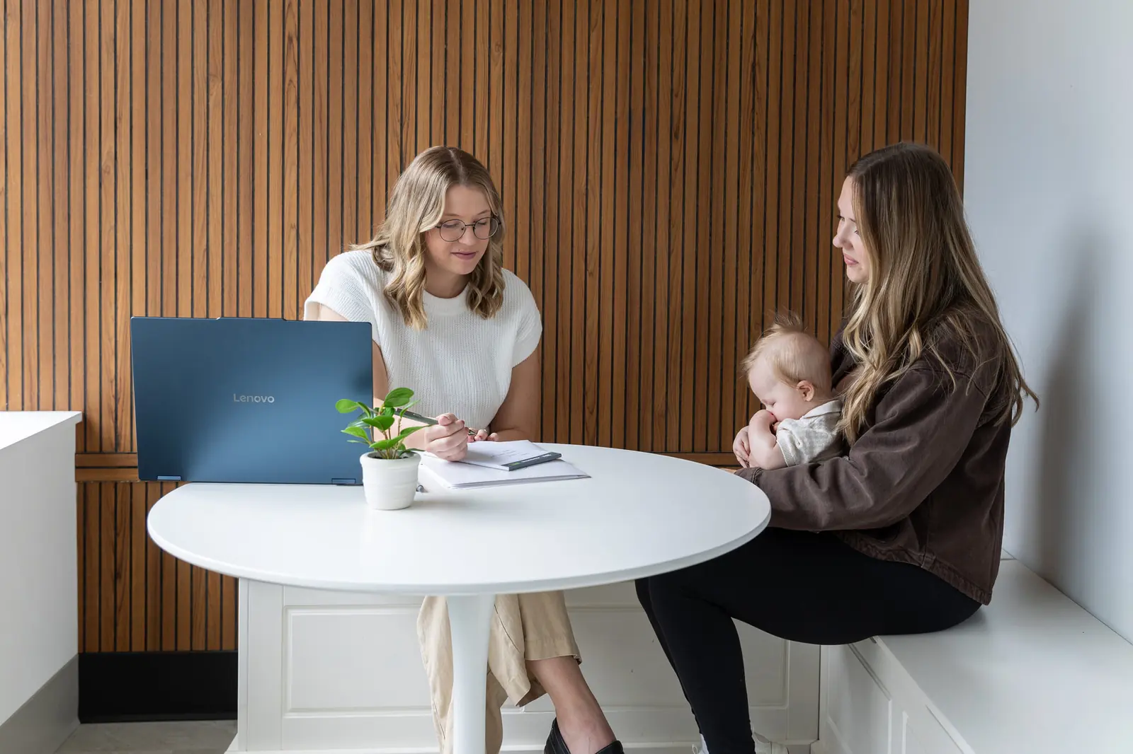 Dr. Abbie meeting with a mother and her baby at Foundations Natural Health, Excelsior, MN